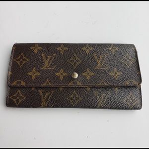 Vintage Louis Vuitton portefeuille Sarah long wallet.